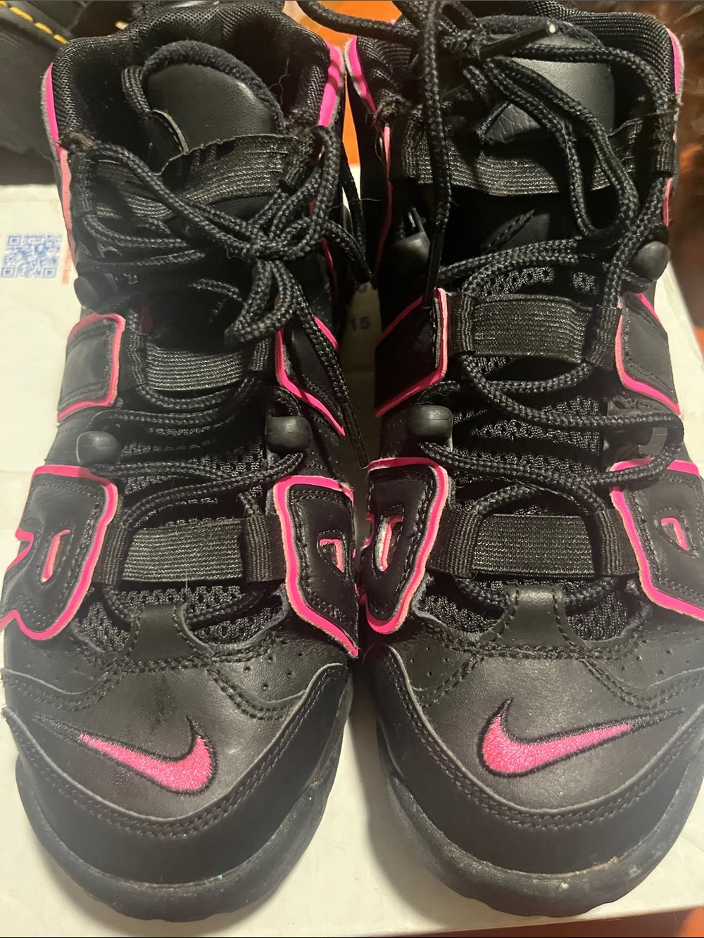 Nike Women’s Black Sneakers with Pink Accents